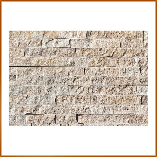 Sandfarbener Naturstein Wandverblender aus Travertin – moderne, strukturierte Oberfläche für stilvolle Wandgestaltung.
