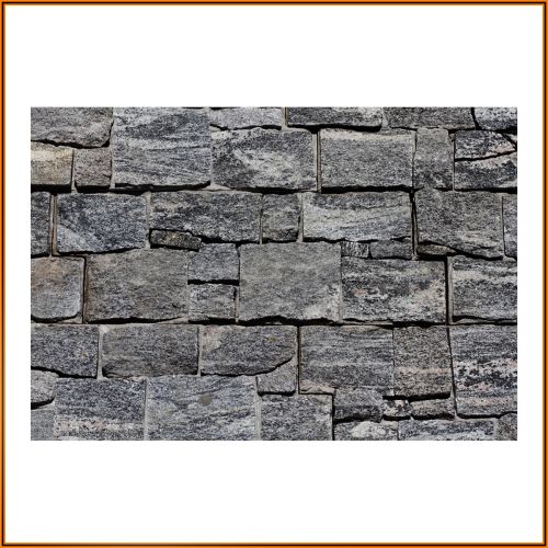 Rustikaler Naturstein Wandverblender aus Granit – strukturierte Oberfläche in Anthrazit für moderne Architektur und Fassaden.